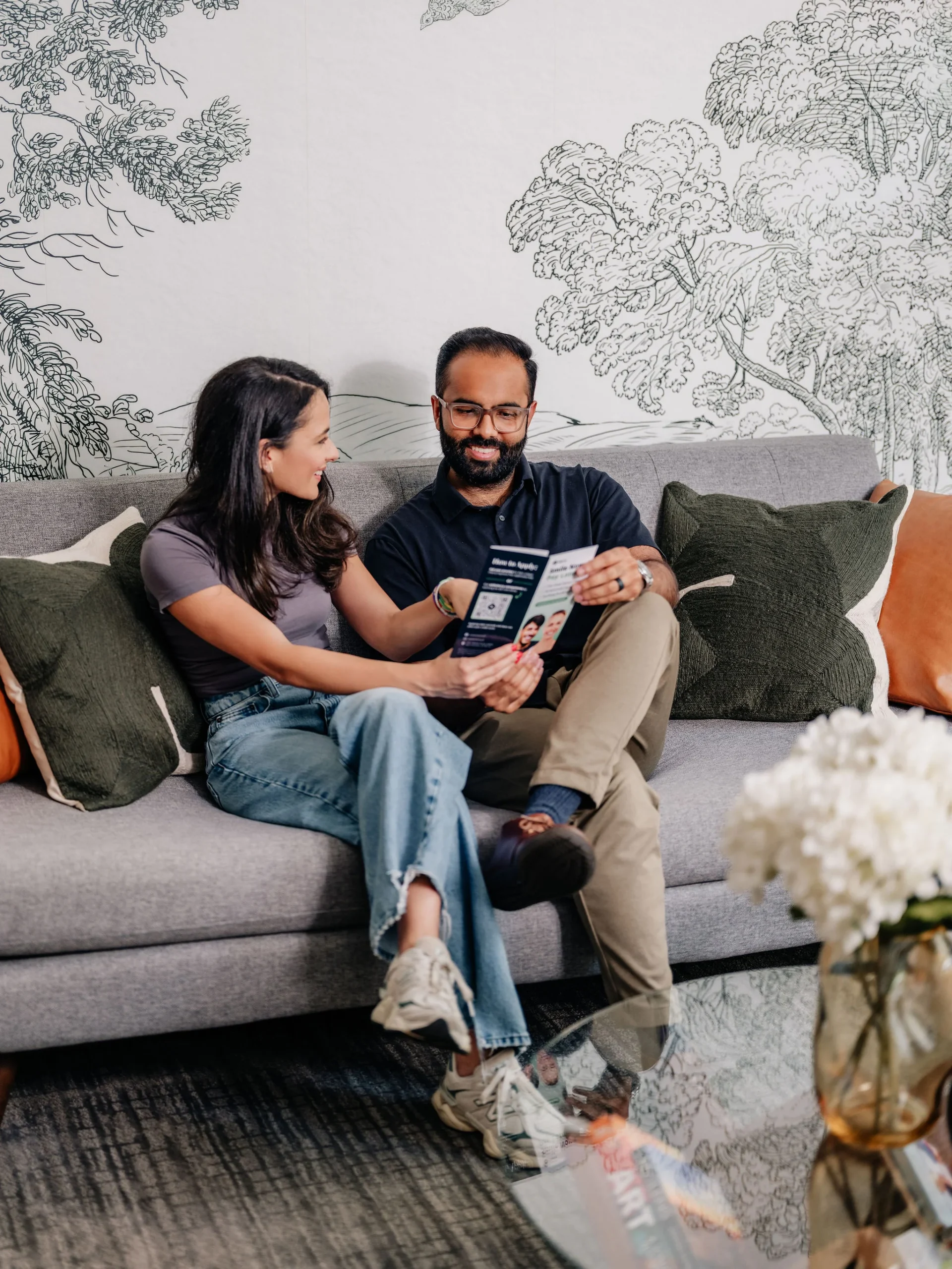 Patients relaxing in the Enamyl Dentistry lounge in Ballston, Arlington