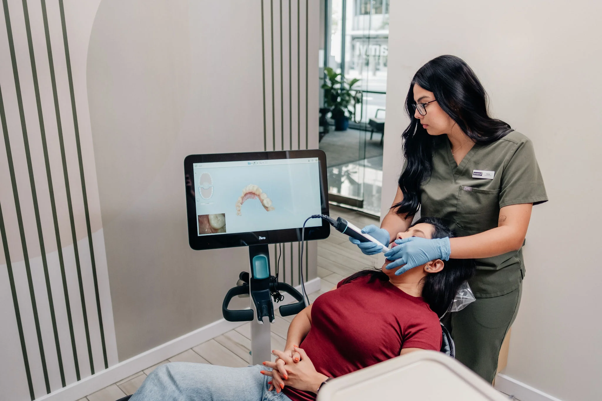 An Enamyl Dentistry team member performing an iTero digital scan in Ballston, Arlington