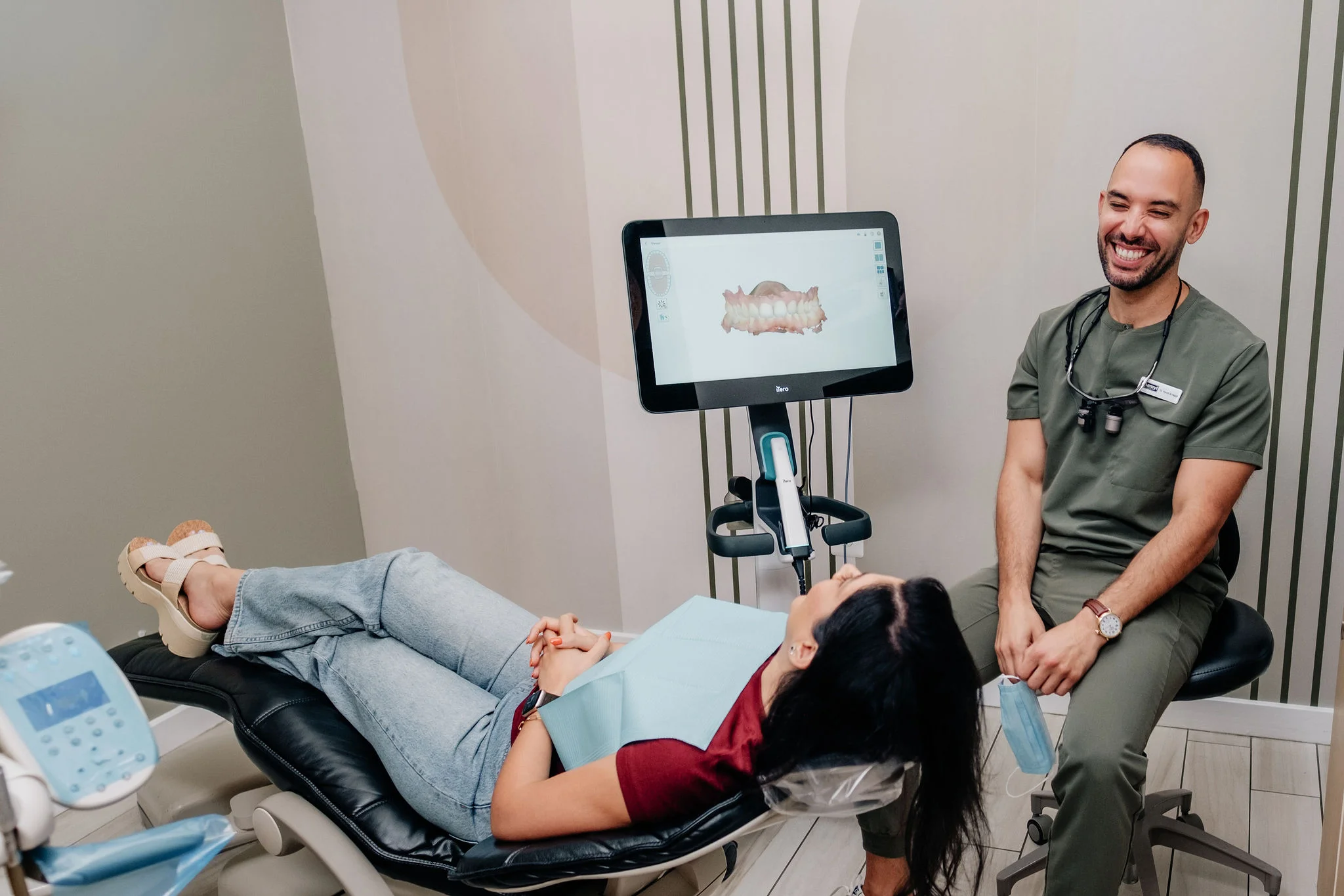 Dr. Al Najafi with a patient at Enamyl Dentistry in Ballston, Arlington