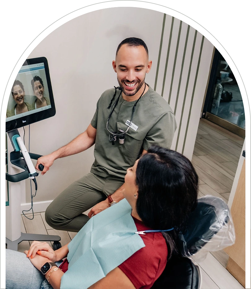 Dr. Al Najafi and the Enamyl Dentistry team welcoming a patient in Ballston, Arlington